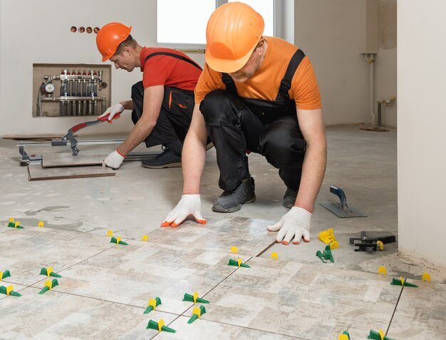 workers are installing ceramic tiles floor_191163 1567