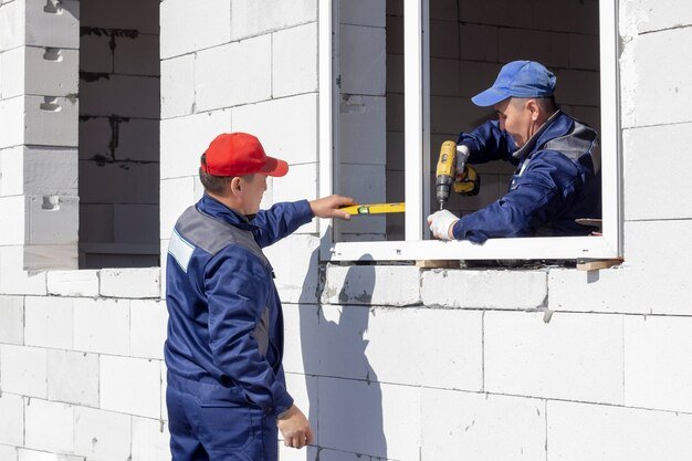 workers install glazing house construction_170532 1589